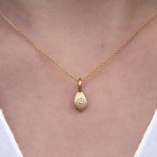 Load image into Gallery viewer, Tiny Santos Charm on Model